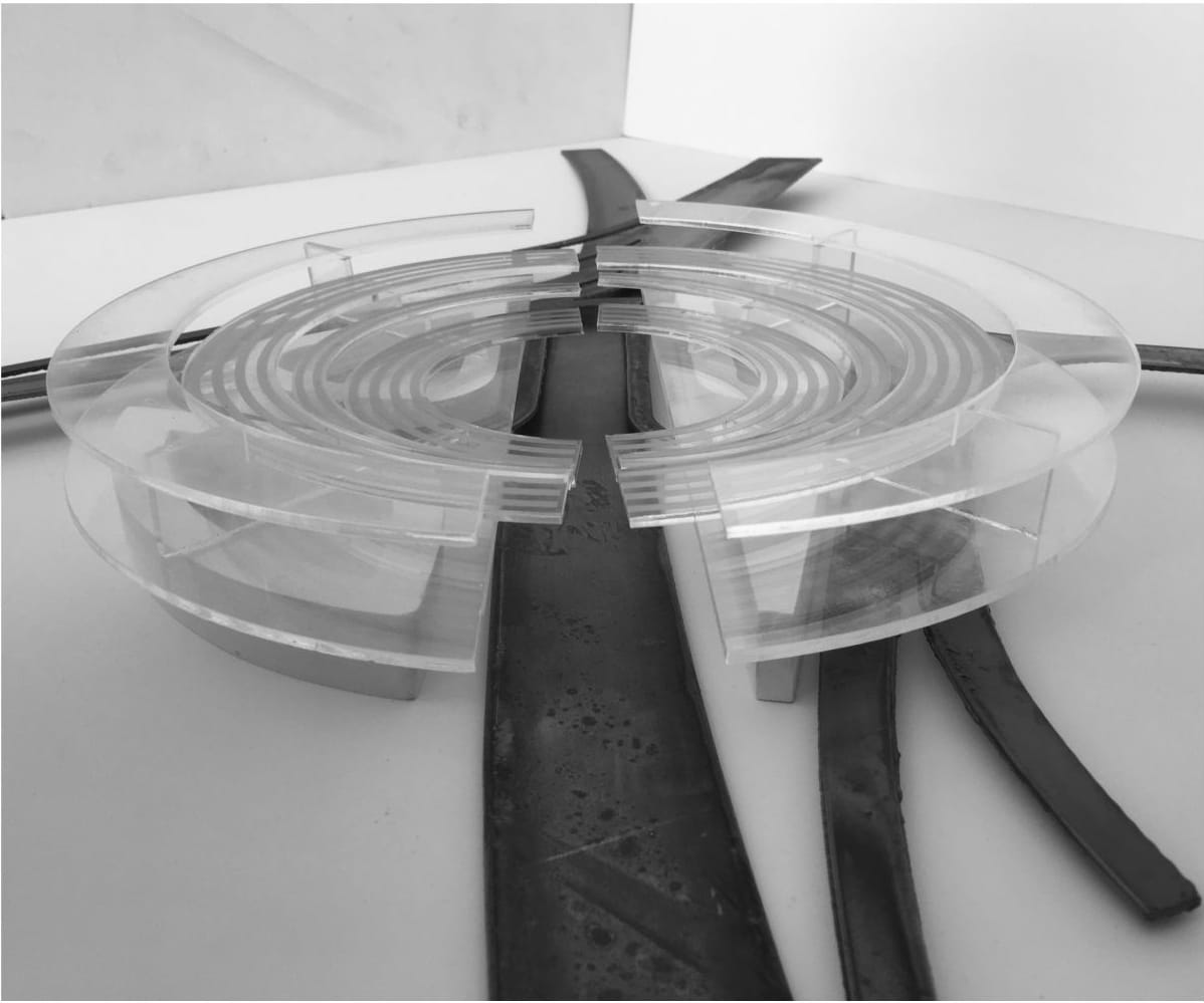 Physical model of the ring over the roads