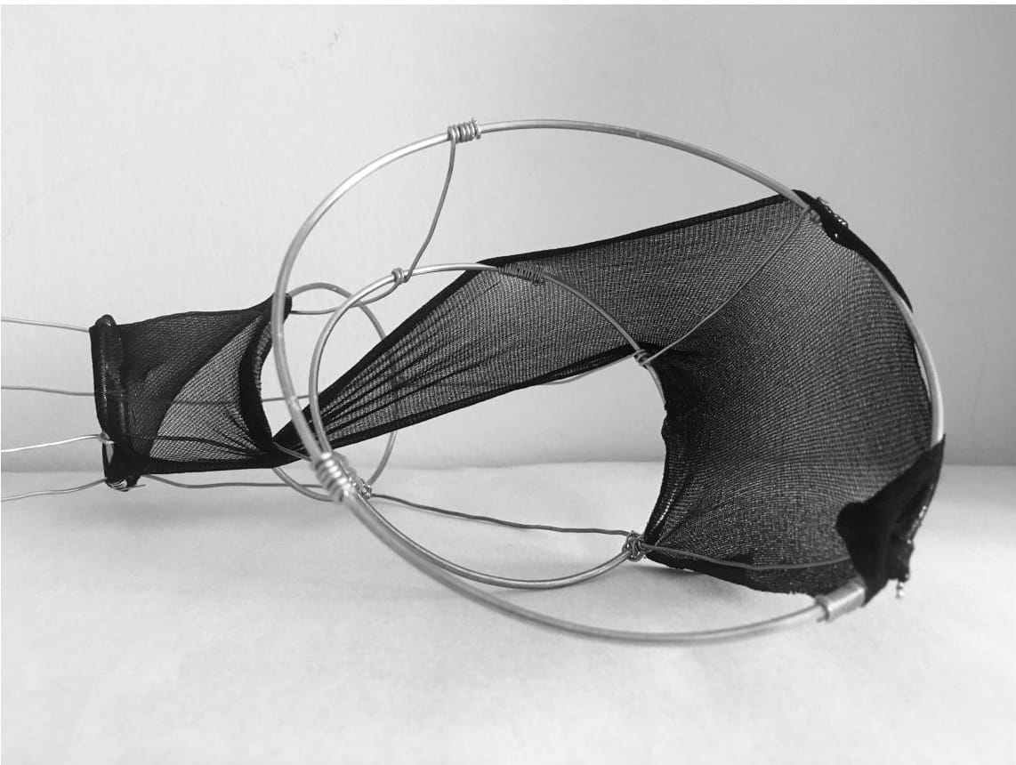 Physical model: mesh stretched over steel rings